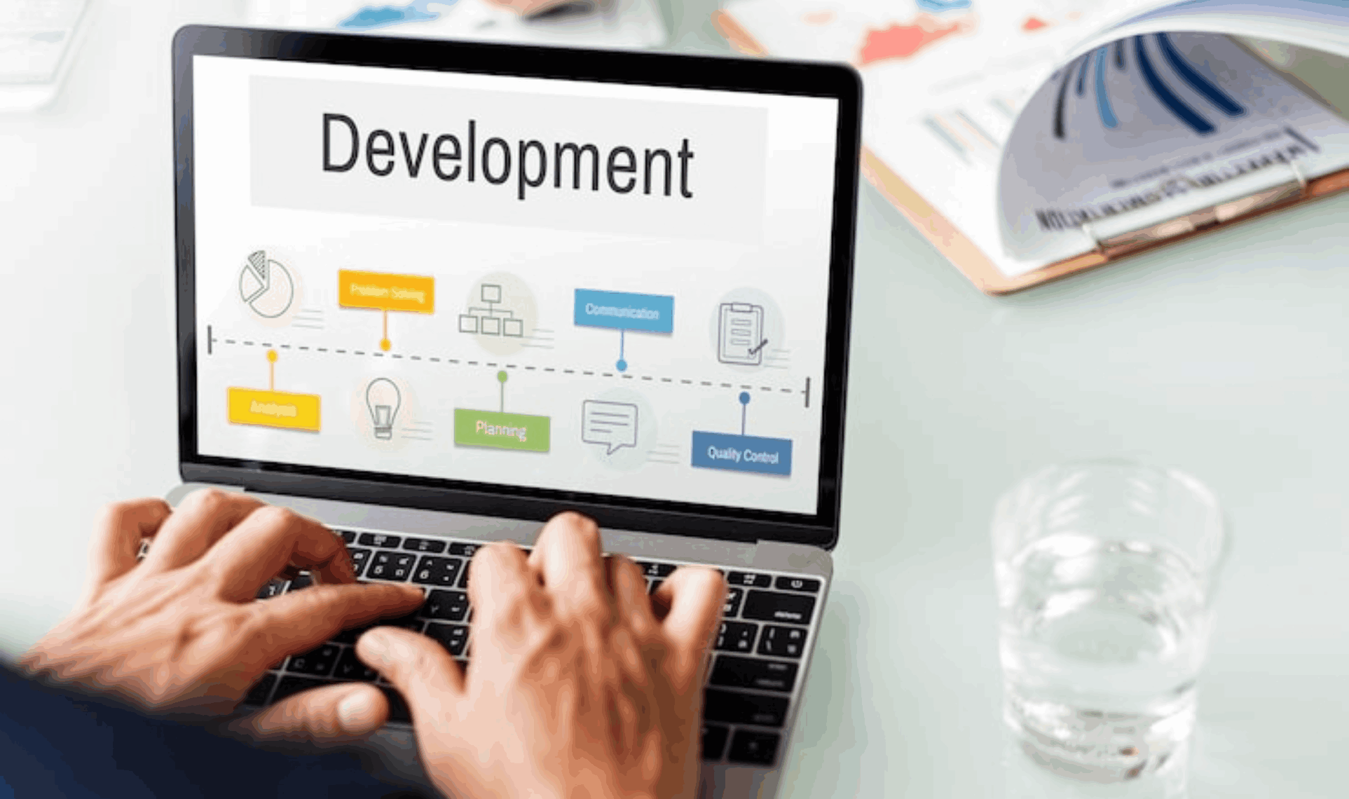 Four professionals collaborating in a modern office lounge