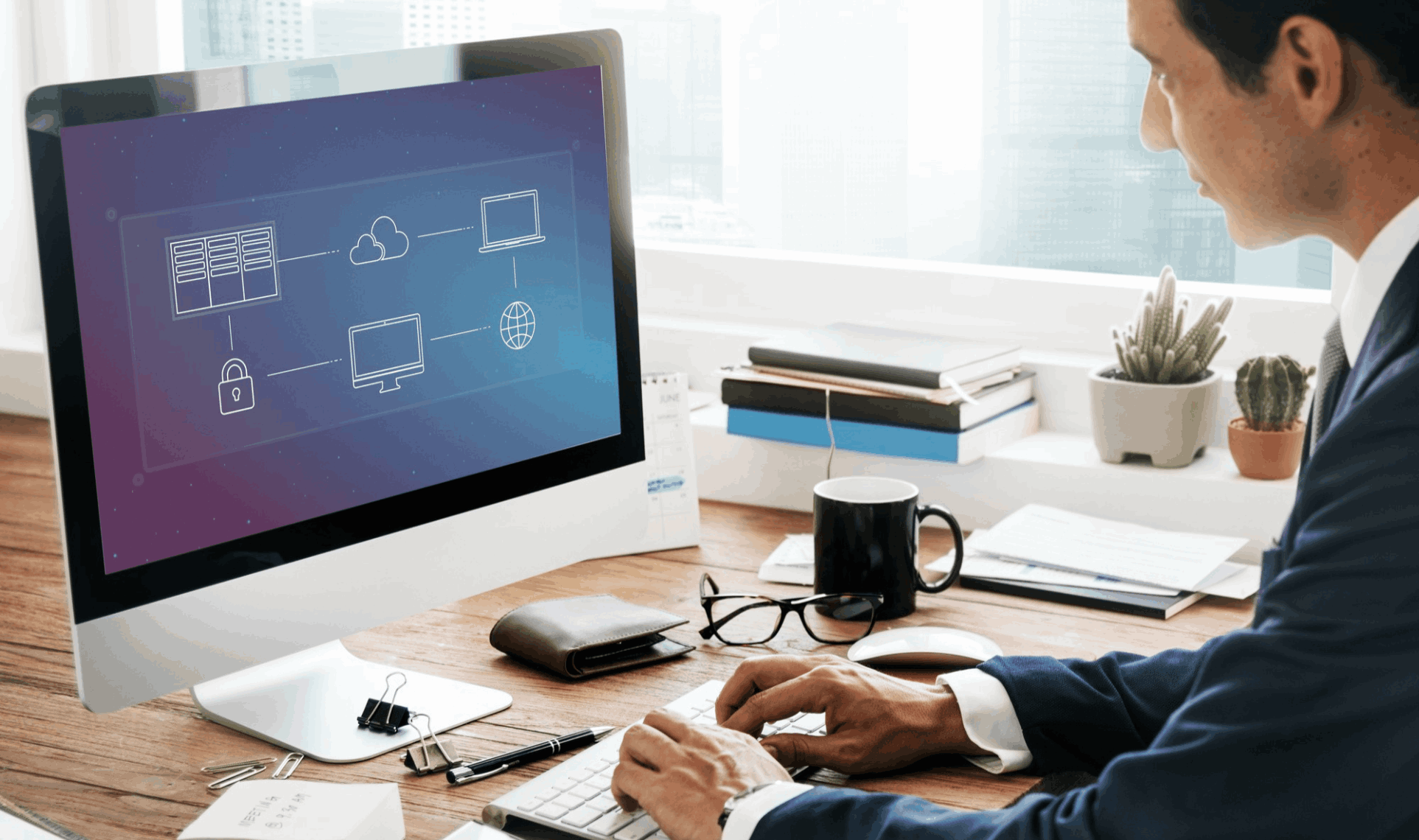 A professional at a desk viewing a computer screen displaying Tools Integration & Pilot Frameworks via a digital infrastructure diagram.
